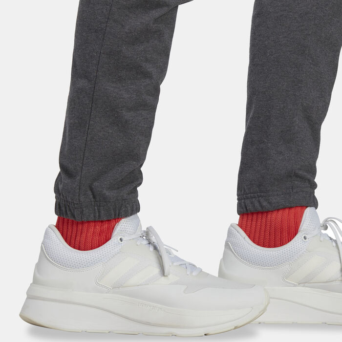 adidas Men's Essentials Badge of Sport Tapered Joggers Beige adidas Men's Essentials Badge of Sport Tapered Joggers Beige image number 4