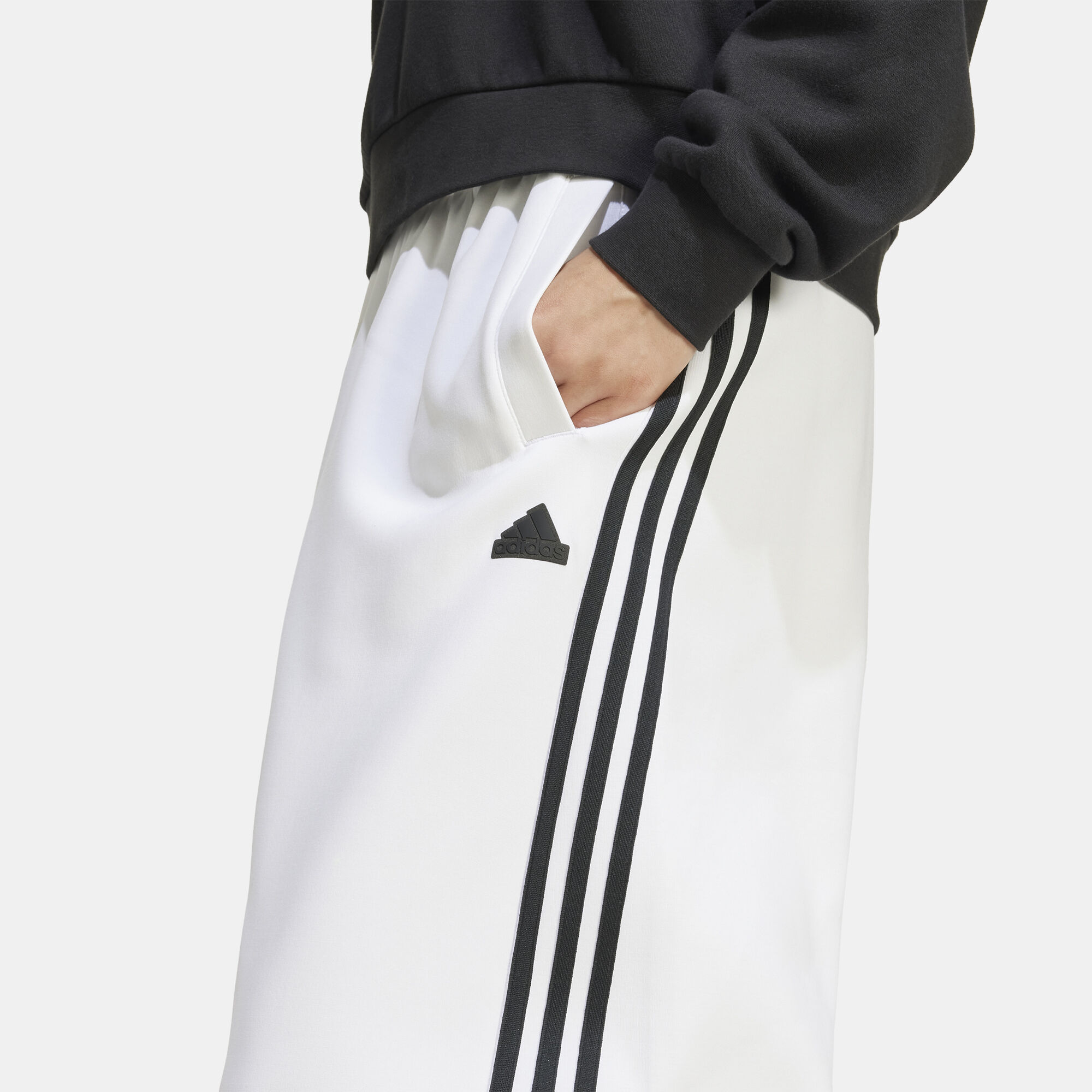 White adidas pants with black stripes on sale