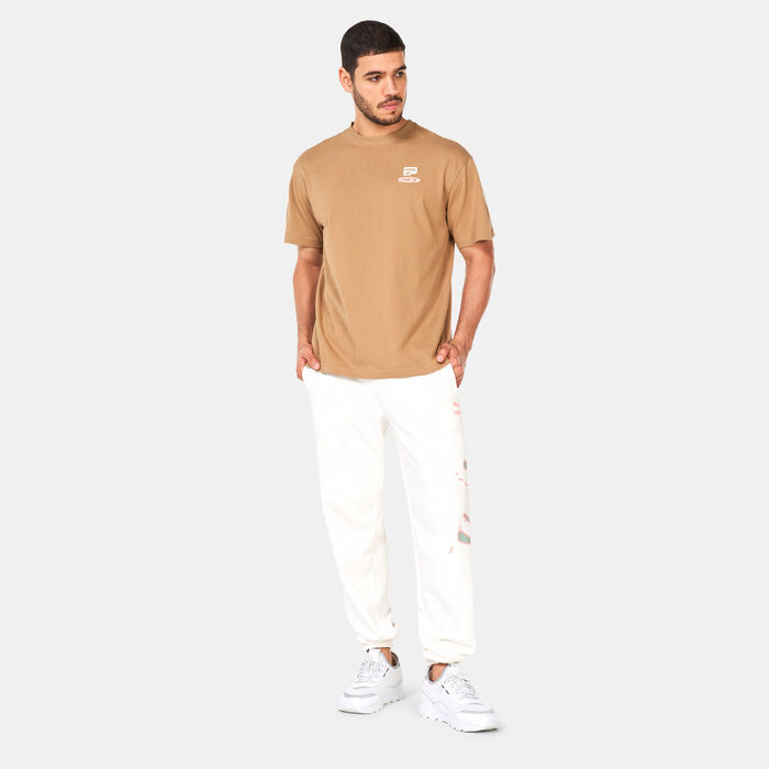 PUMA Men's DOWNTOWN Graphic T-Shirt Beige PUMA Men's DOWNTOWN Graphic T-Shirt Beige image number 2