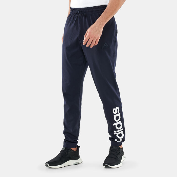 adidas Men's Essentials Single Jersey Tapered Elastic Cuff Logo Pants Blue adidas Men's Essentials Single Jersey Tapered Elastic Cuff Logo Pants Blue image number 0