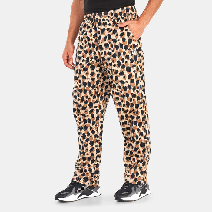 PUMA Men's DOWNTOWN Printed Woven Pants Brown PUMA Men's DOWNTOWN Printed Woven Pants Brown image number 0
