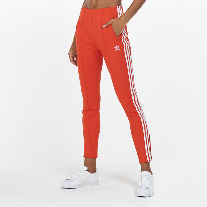 adidas Originals Women's Primeblue SST Trackpants Red adidas Originals Women's Primeblue SST Trackpants Red image number 0