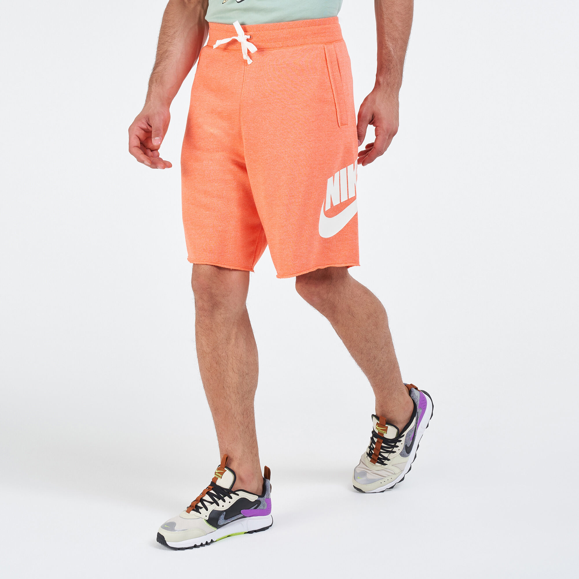 Men s Sportswear Alumni Shorts Orange Nike in Qatar SSS