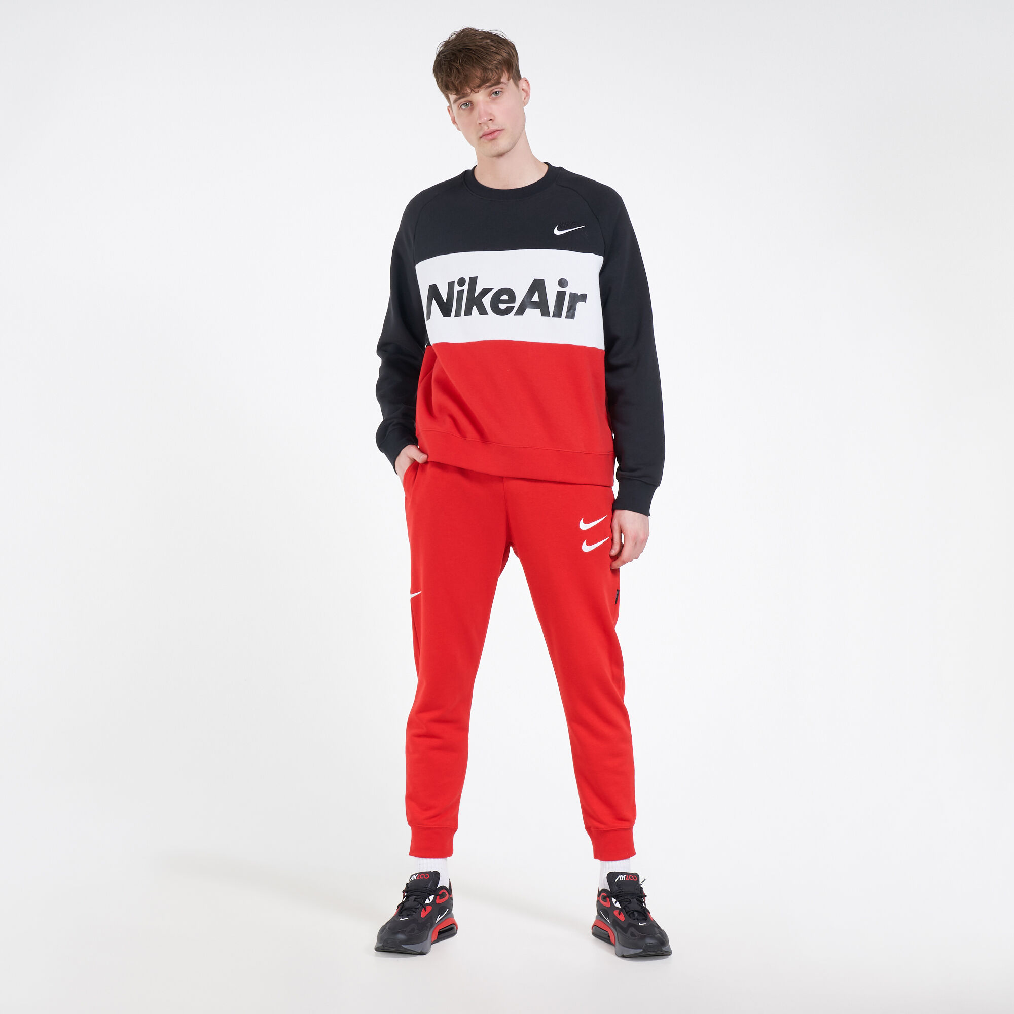 Men s Sportswear Swoosh Sweatpants Red Nike in Qatar SSS