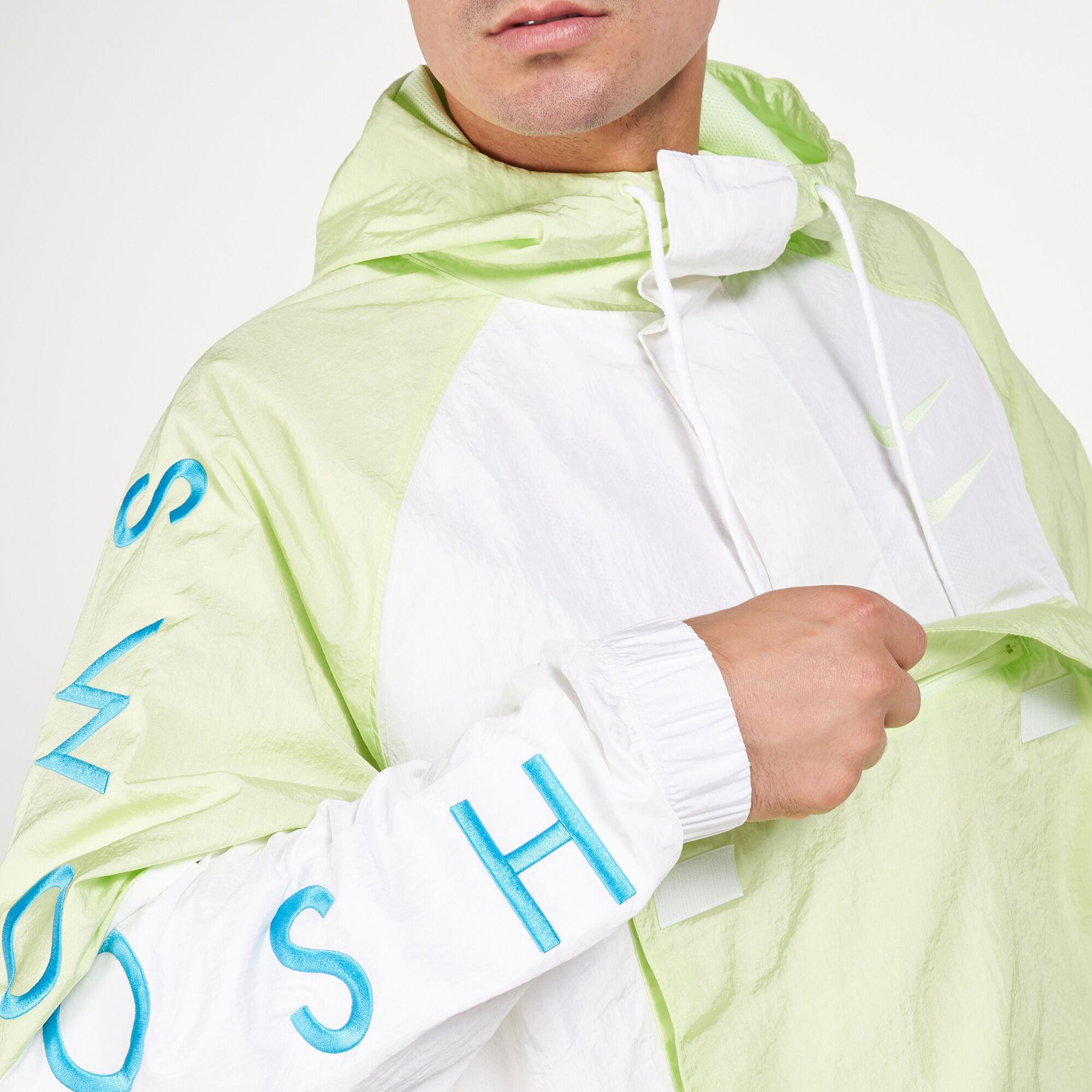 Men s Sportswear Swoosh Woven Jacket yellow Nike in Qatar SSS