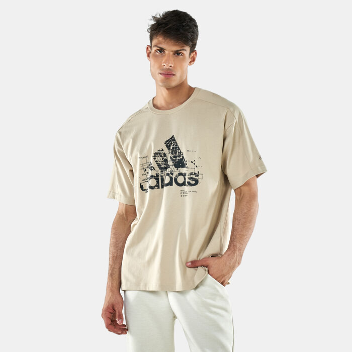adidas Men's PRSVE Badge Of Sports T-Shirt Beige adidas Men's PRSVE Badge Of Sports T-Shirt Beige image number 0