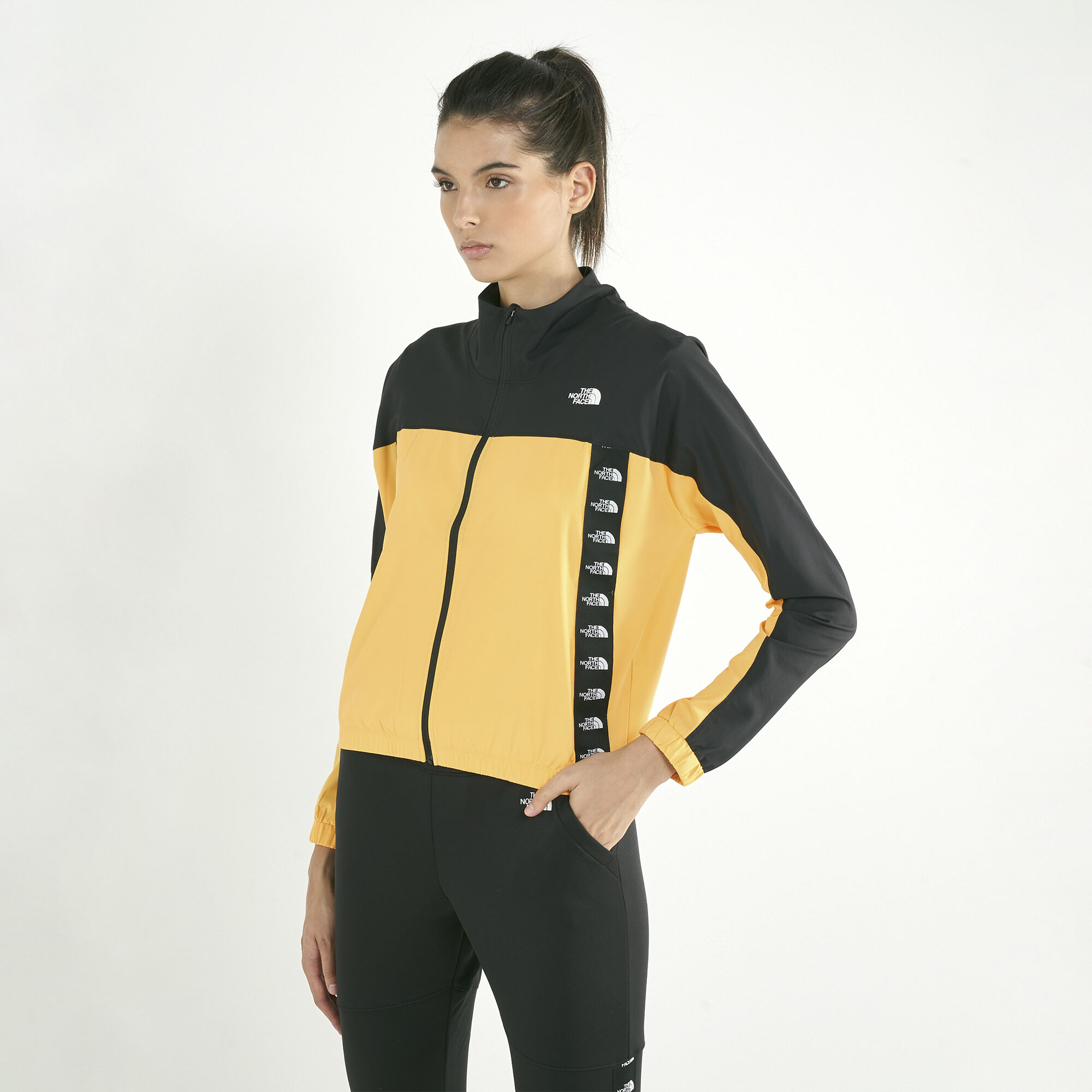 Buy The North Face Women s Train N Logo Crop Wind Jacket yellow in