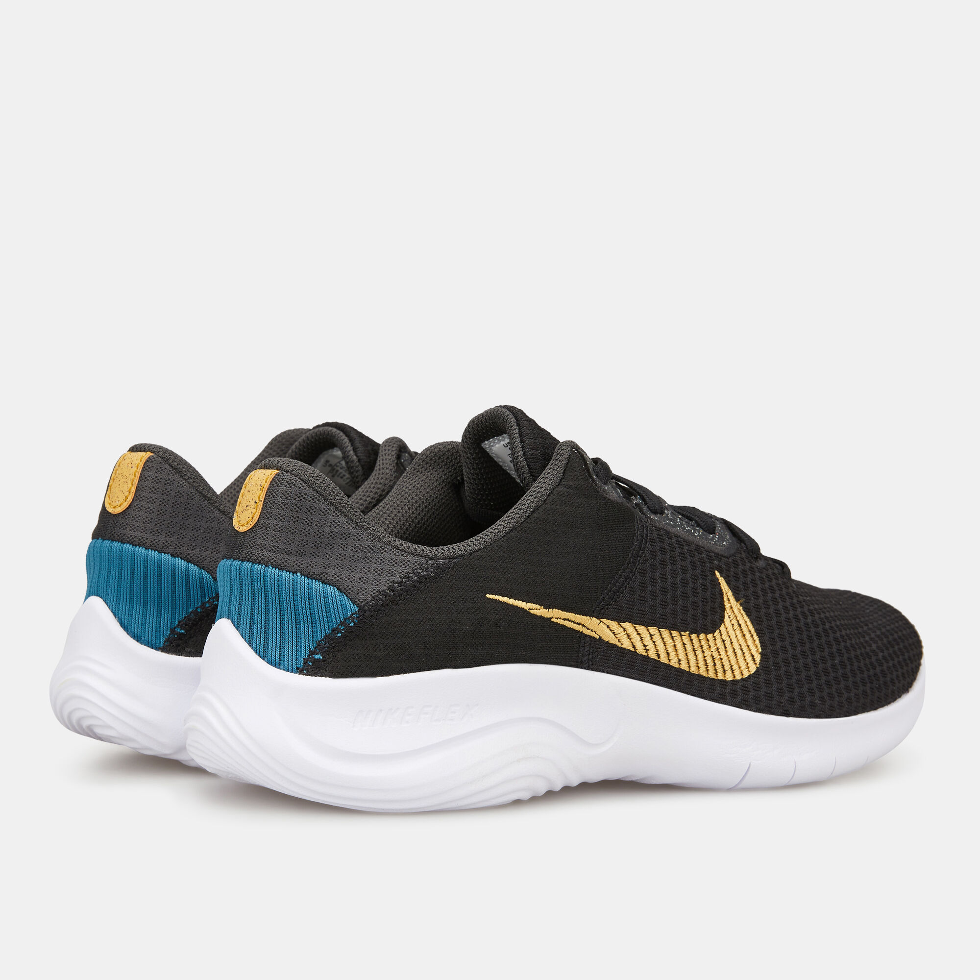 Nike women's renew rival shoe - black/metallic gold-obsidian best sale