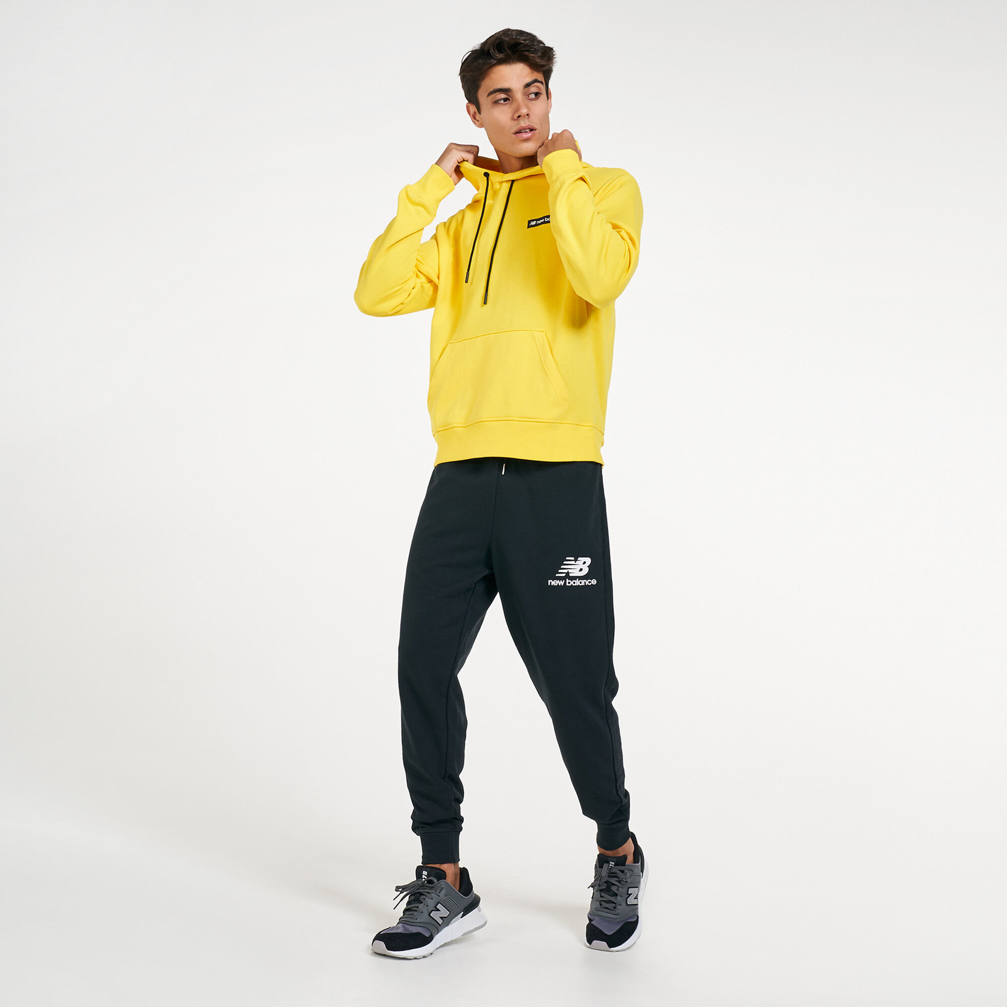 Men s Essentials Stacked Logo Sweatpants Black New Balance in Qatar SSS