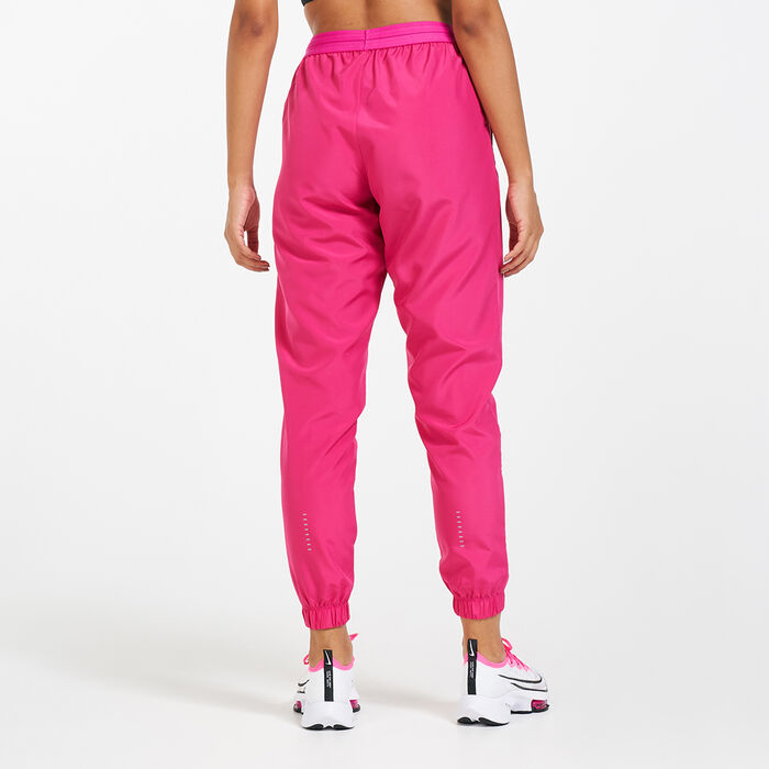Nike Women's Sportswear Swoosh Run Track Pants Red Nike Women's Sportswear Swoosh Run Track Pants Red image number 1