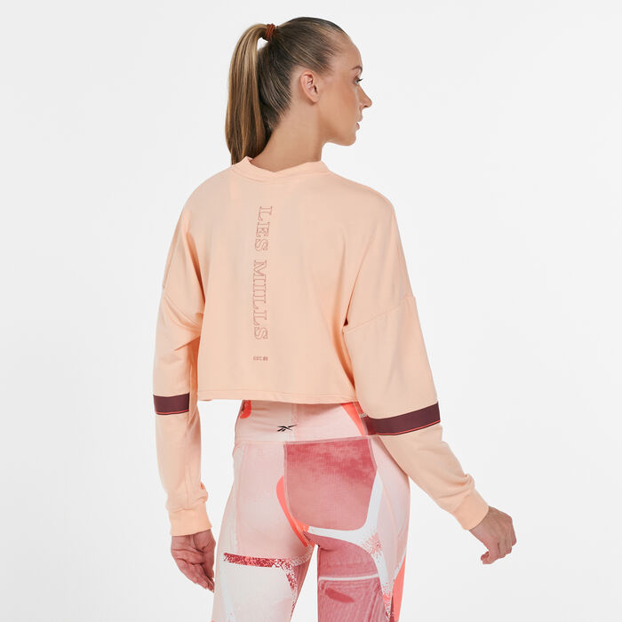 Reebok Women's Les Mills® Lightweight French Terry Crew Sweatshirt Orange image number 1