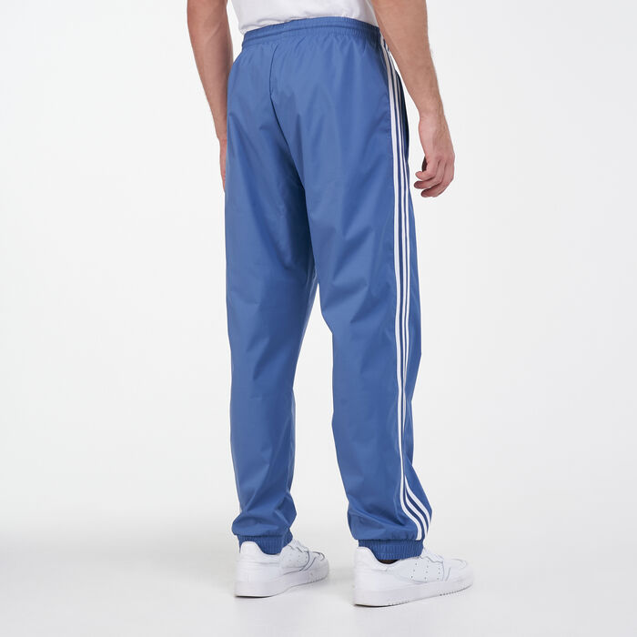 adidas Originals Men's Adicolor 3D Trefoil 3-Stripes Track Pants adidas Originals Men's Adicolor 3D Trefoil 3-Stripes Track Pants image number 1