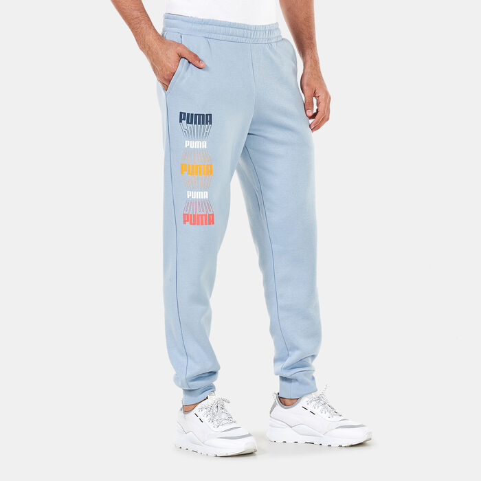 PUMA Men's Logo Repeat Graphic Sweatpants Blue PUMA Men's Logo Repeat Graphic Sweatpants Blue image number 0