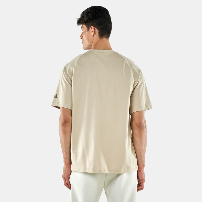 adidas Men's PRSVE Badge Of Sports T-Shirt Beige adidas Men's PRSVE Badge Of Sports T-Shirt Beige image number 1