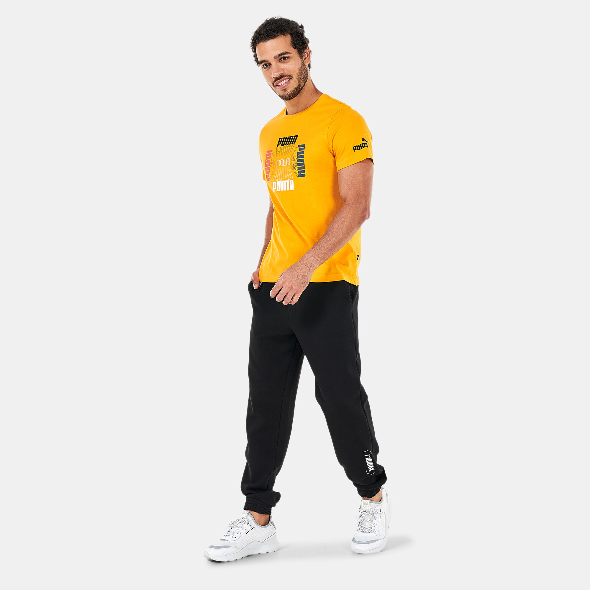 Men s Repeat Logo Graphic T Shirt yellow PUMA in Qatar SSS