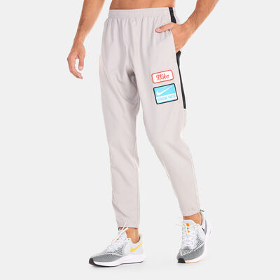 Nike Men’s Dri-FIT Challenger Woven Pants Grey