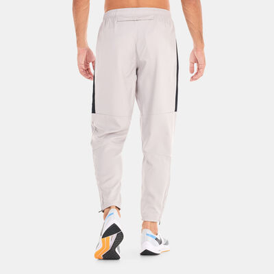 Nike Men’s Dri-FIT Challenger Woven Pants Grey