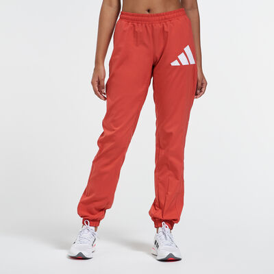 adidas Women's Woven Badge of Sport Sweatpants Red