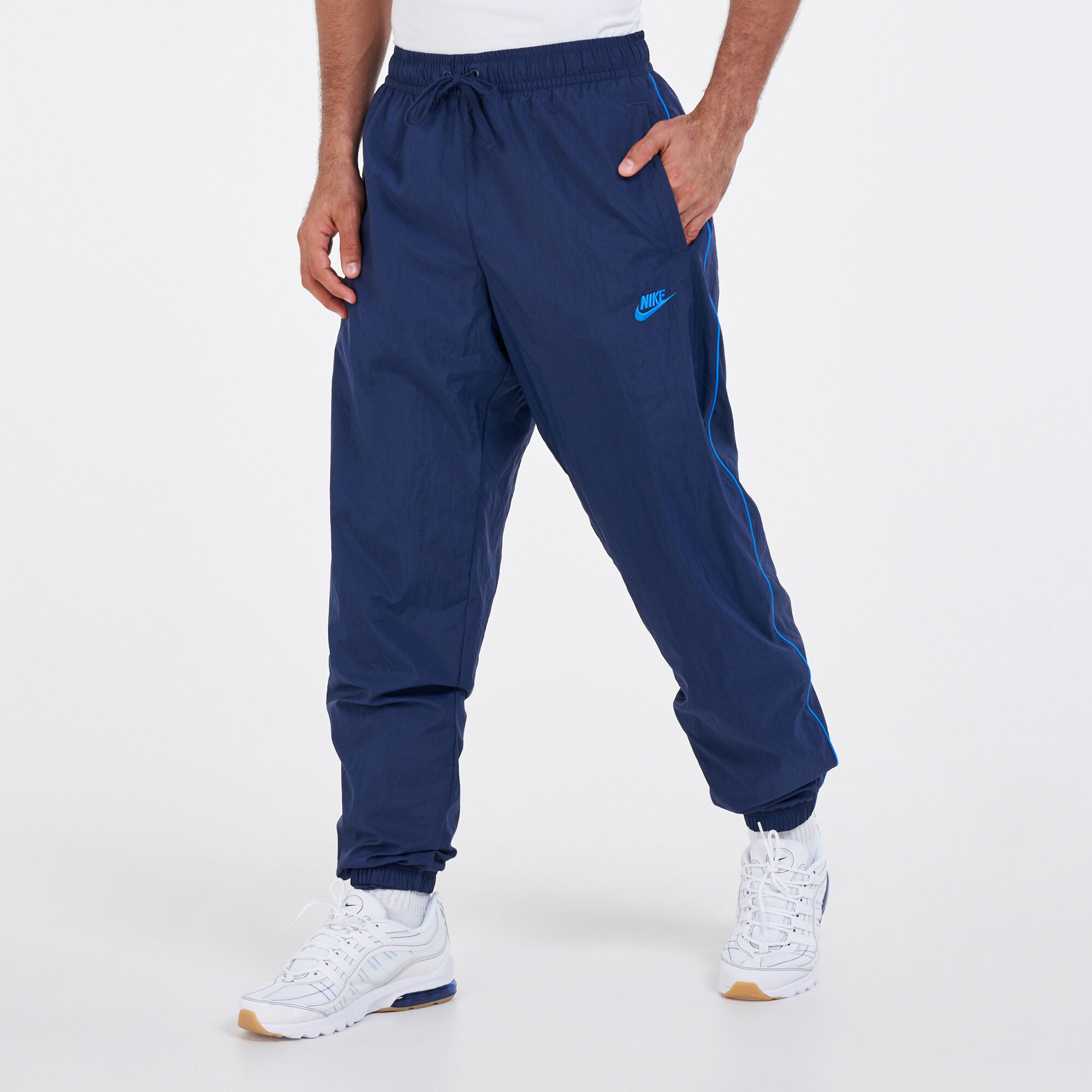 Men s Sportswear Core Track Pants Blue Nike in Qatar SSS