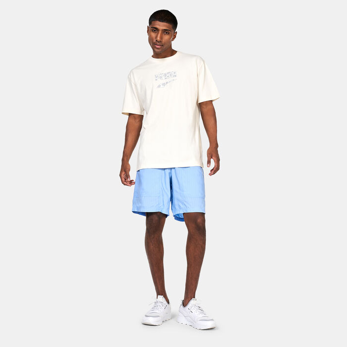PUMA Men's DOWNTOWN Logo Graphic T-Shirt Ivory PUMA Men's DOWNTOWN Logo Graphic T-Shirt Ivory image number 2