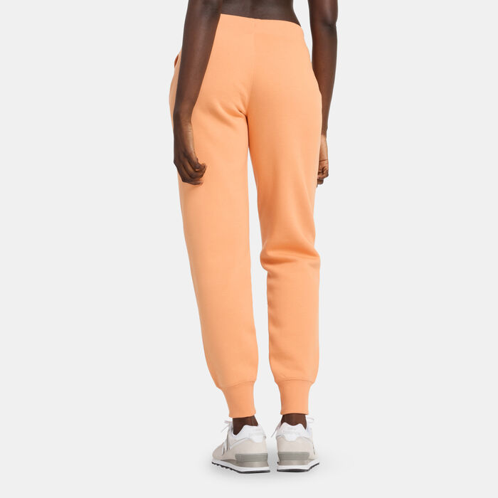 New Balance Women's Classic Core Fleece Pants Orange image number 1