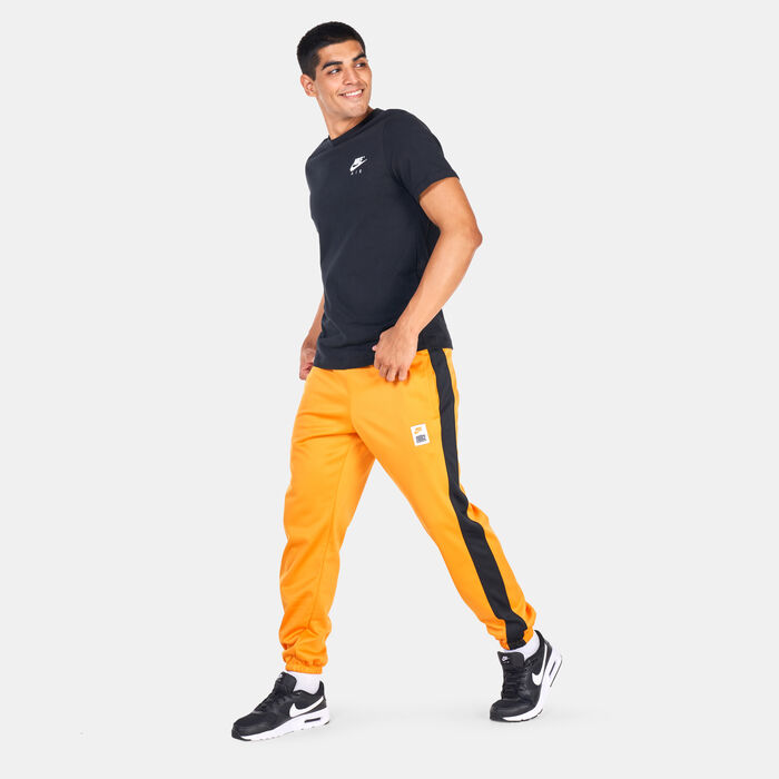 Nike Men's Therma-FIT Starting 5 Basketball Fleece Pants Orange image number 2