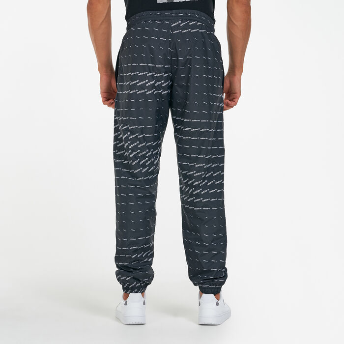 adidas Men's Monogram Graphic Sweatpants Black adidas Men's Monogram Graphic Sweatpants Black image number 1