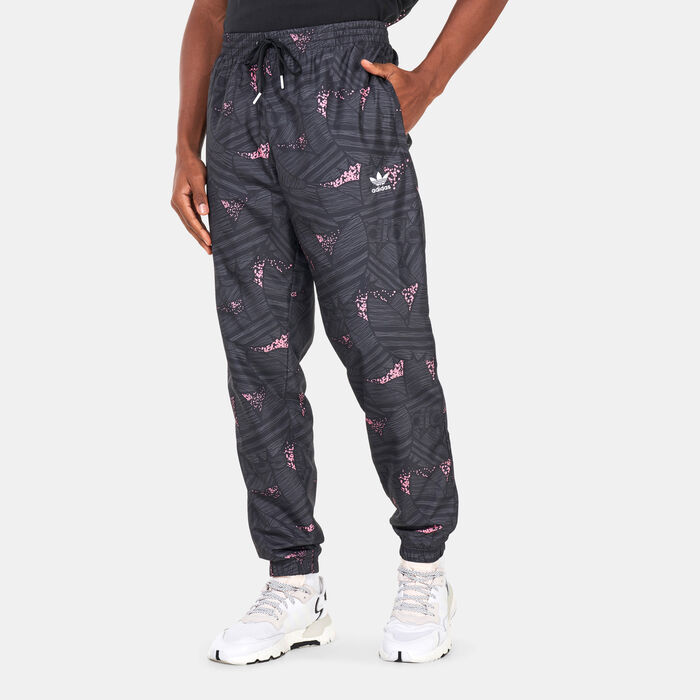 adidas Originals Men's Rekive Trefoil All Over Print Track Pants Black adidas Originals Men's Rekive Trefoil All Over Print Track Pants Black image number 0