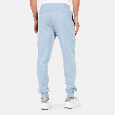 PUMA Men's Logo Repeat Graphic Sweatpants Blue