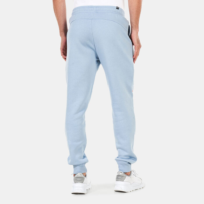 PUMA Men's Logo Repeat Graphic Sweatpants Blue PUMA Men's Logo Repeat Graphic Sweatpants Blue image number 1