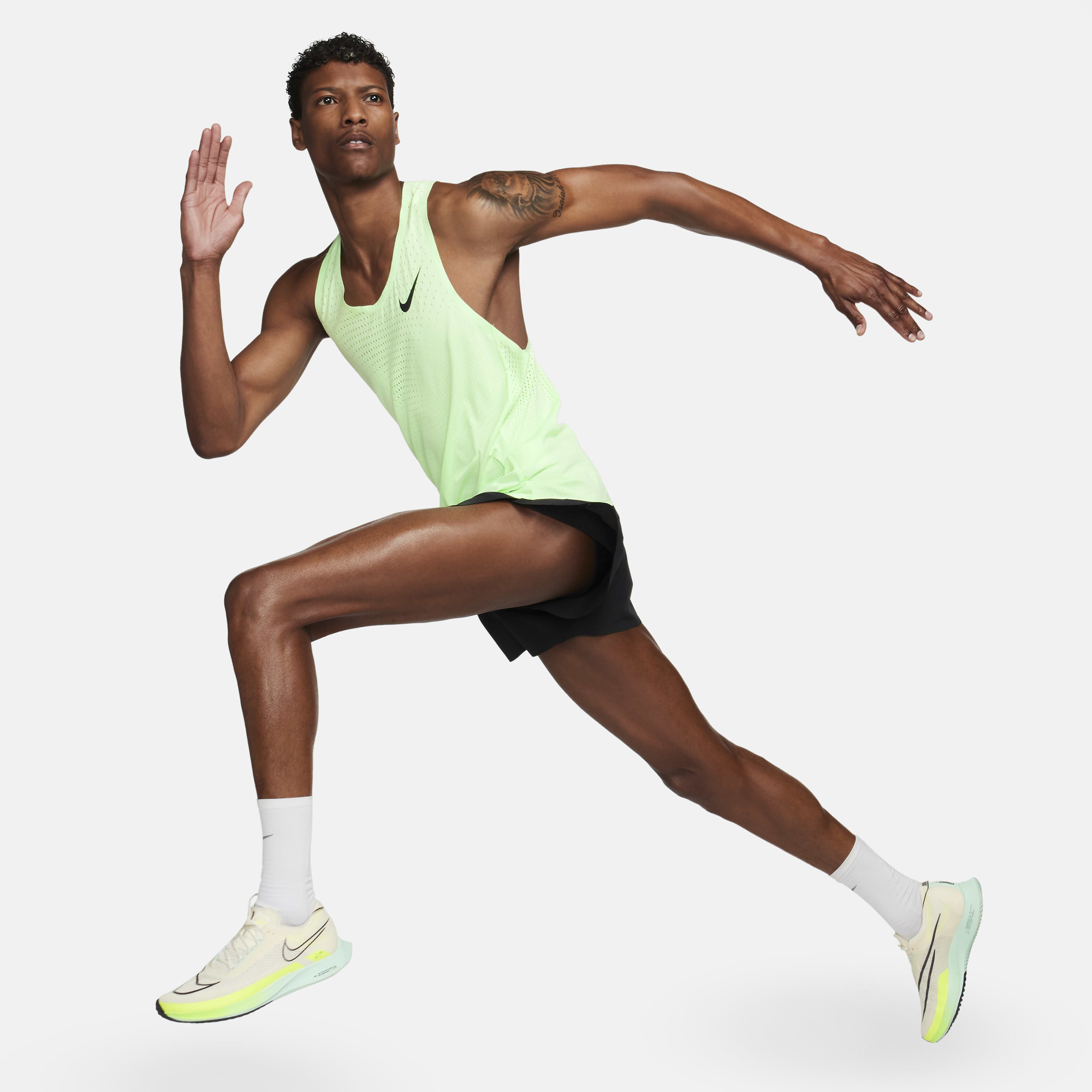 Men s AeroSwift Dri FIT ADV Running Vest Green Nike in Qatar SSS