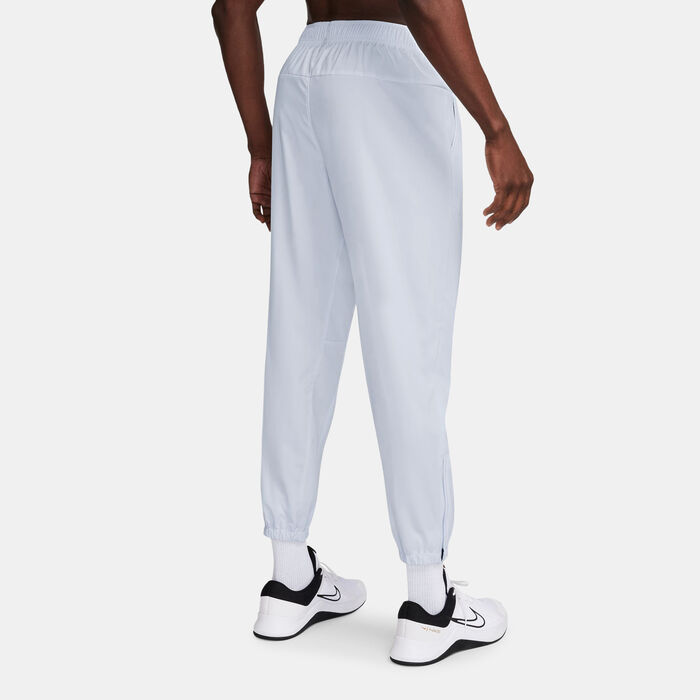 Nike Men's Form Dri-FIT Versatile Training Pants Grey Nike Men's Form Dri-FIT Versatile Training Pants Grey image number 1