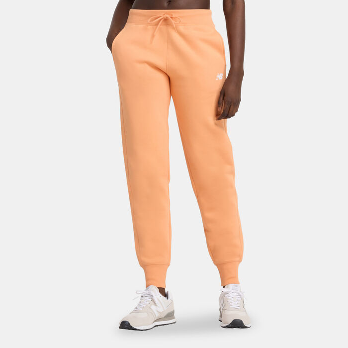 New Balance Women's Classic Core Fleece Pants Orange New Balance Women's Classic Core Fleece Pants Orange image number 0