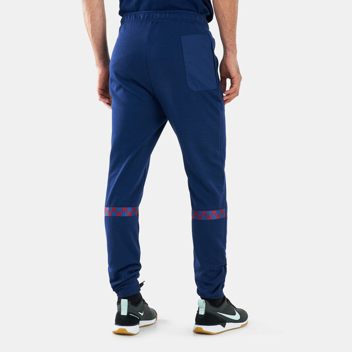 Nike Men's F.C. Barcelona Dri-FIT Travel Fleece Sweatpants Blue image number 1