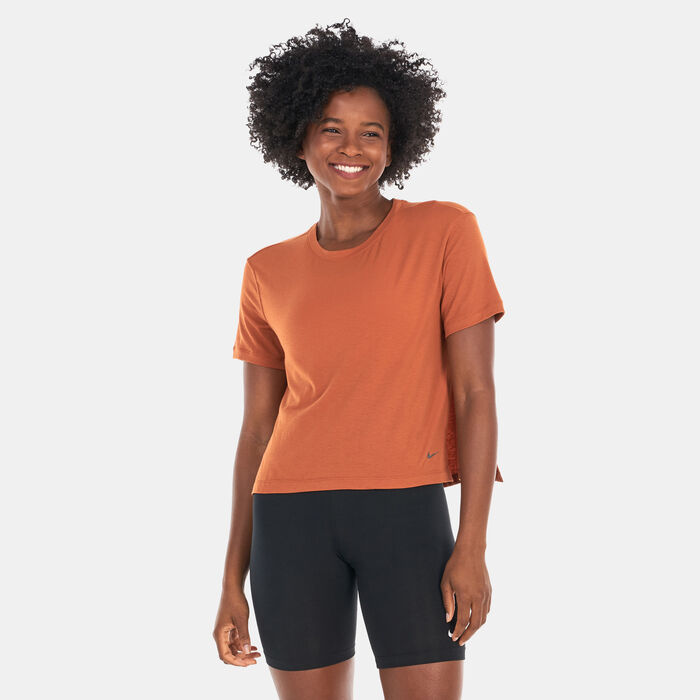 Nike Women's Yoga Dri-FIT Training Top Orange Nike Women's Yoga Dri-FIT Training Top Orange image number 0