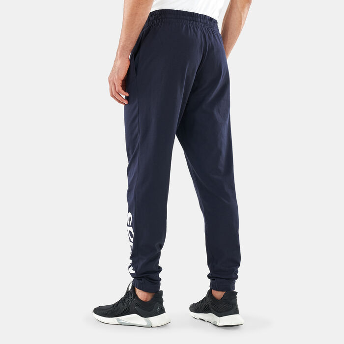 adidas Men's Essentials Single Jersey Tapered Elastic Cuff Logo Pants Blue adidas Men's Essentials Single Jersey Tapered Elastic Cuff Logo Pants Blue image number 1