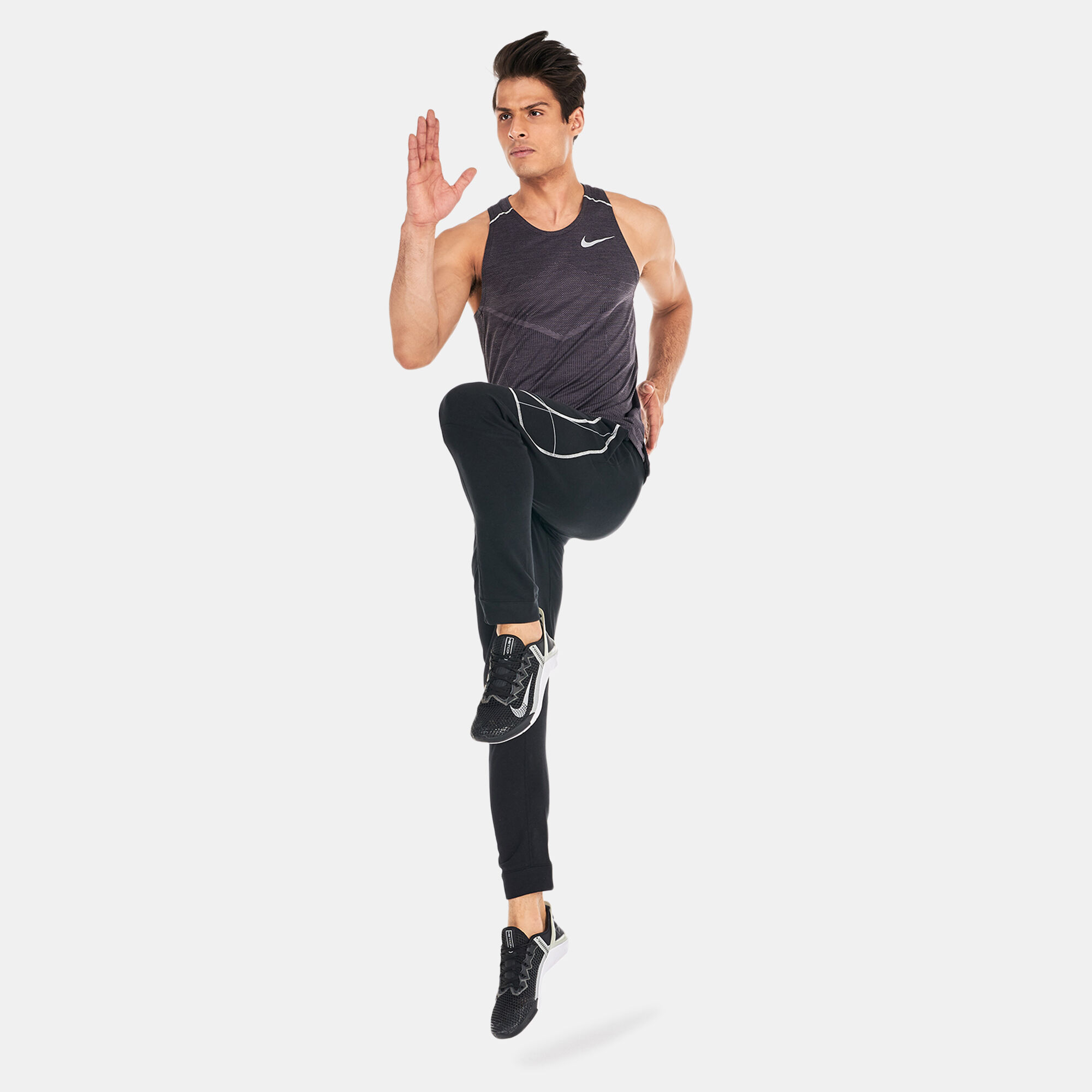 Nike tapered running pants sales
