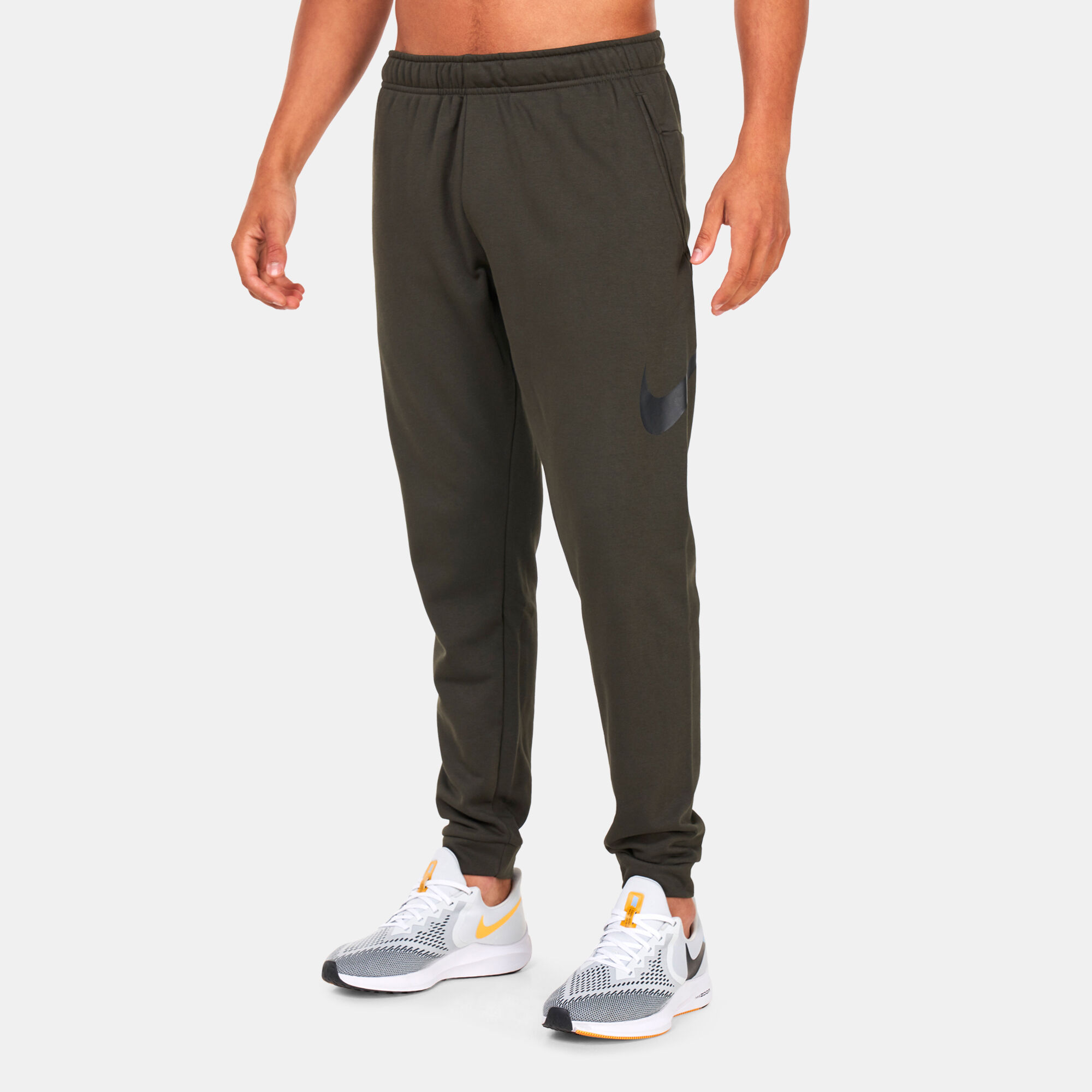 Nike Men s Dri FIT Dry Graphic Tapered Training Pants Green in