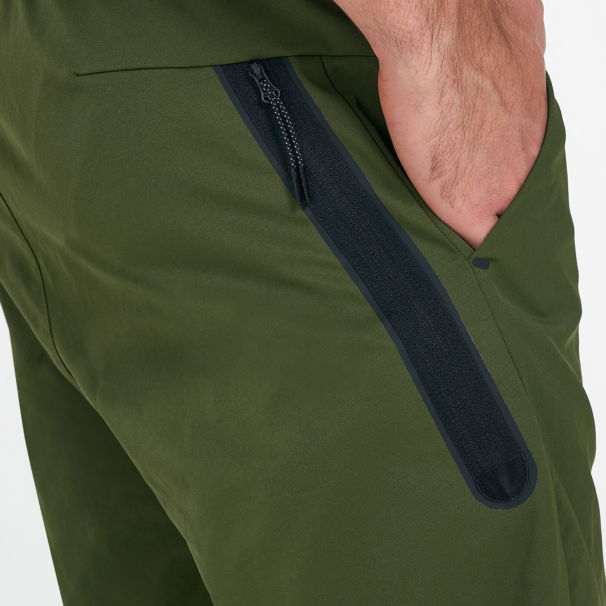 Men s Sportswear Tech Essentials Unlined Commuter Pants Green Nike in Qatar SSS