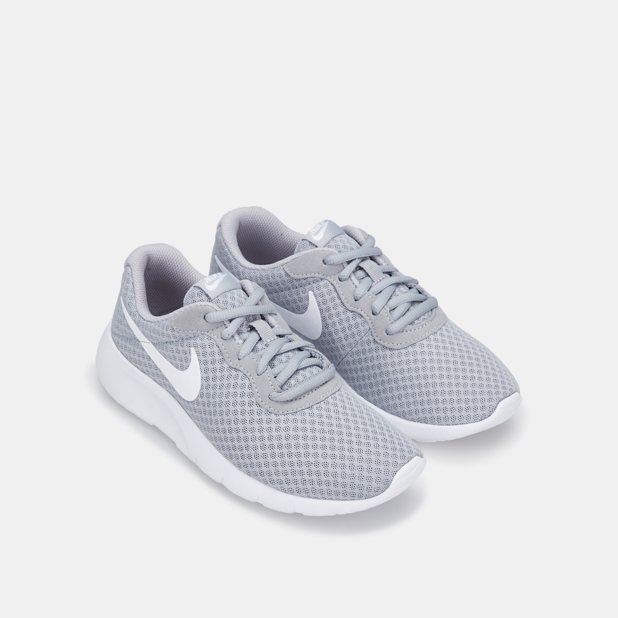 Kids Tanjun Shoe Older Kids Grey Nike in Qatar SSS