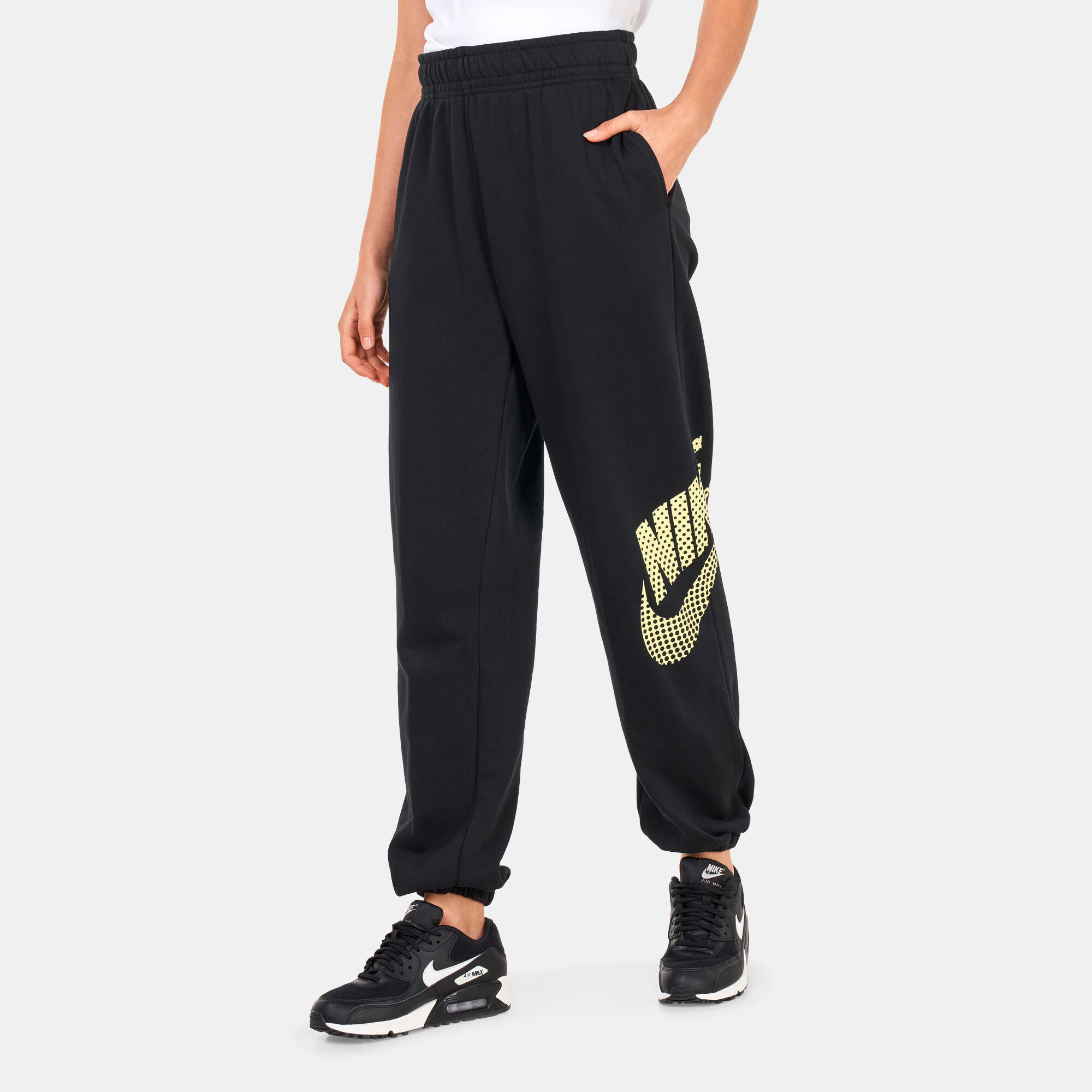 Black and gold nike sweatpants 2025