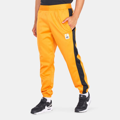 Nike Men's Therma-FIT Starting 5 Basketball Fleece Pants Orange