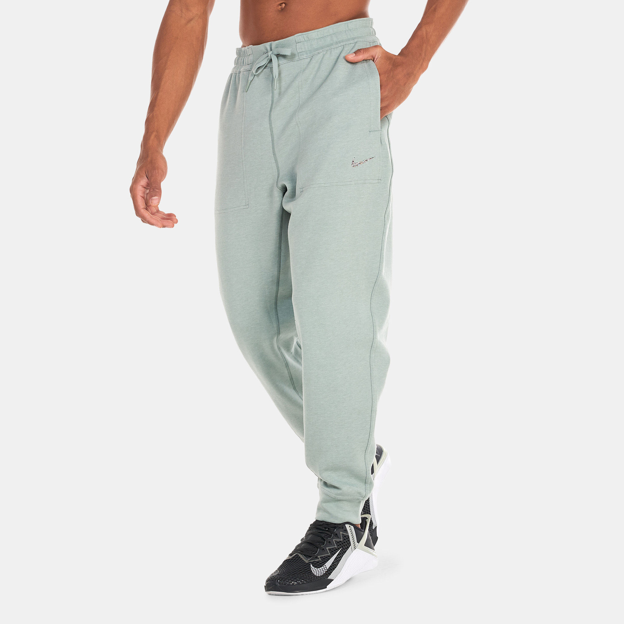 Men s Dri FIT Fleece Restore Sweatpants Green Nike in Qatar SSS