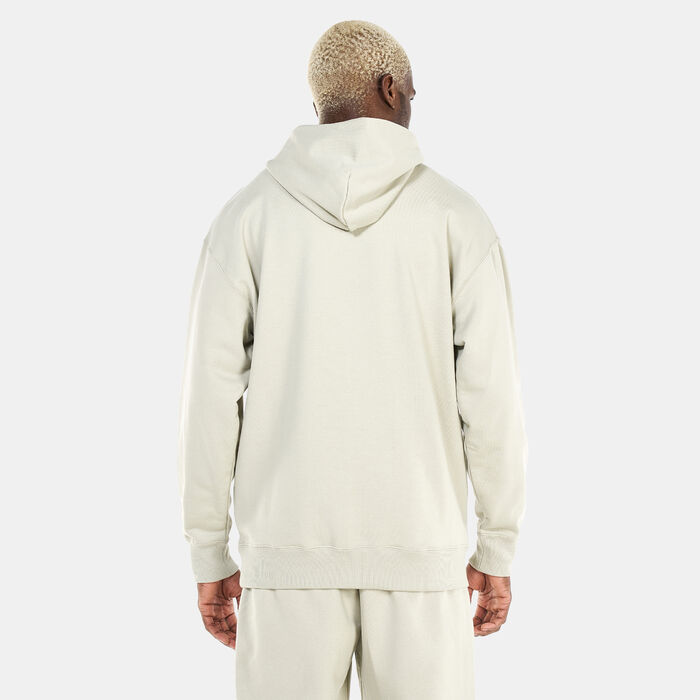 PUMA Men's Classics Relaxed Hoodie Beige PUMA Men's Classics Relaxed Hoodie Beige image number 1