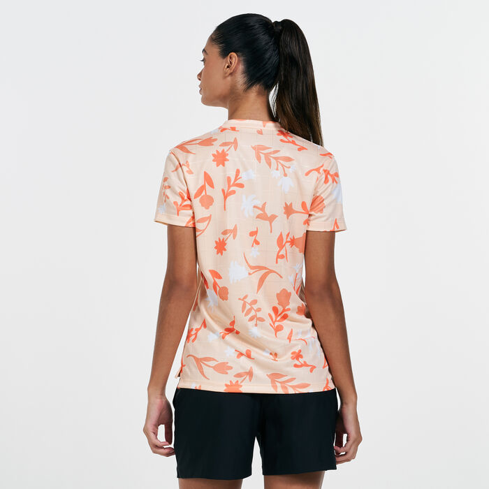 Nike Golf Women's Floral Polo T-Shirt Orange Nike Golf Women's Floral Polo T-Shirt Orange image number 1