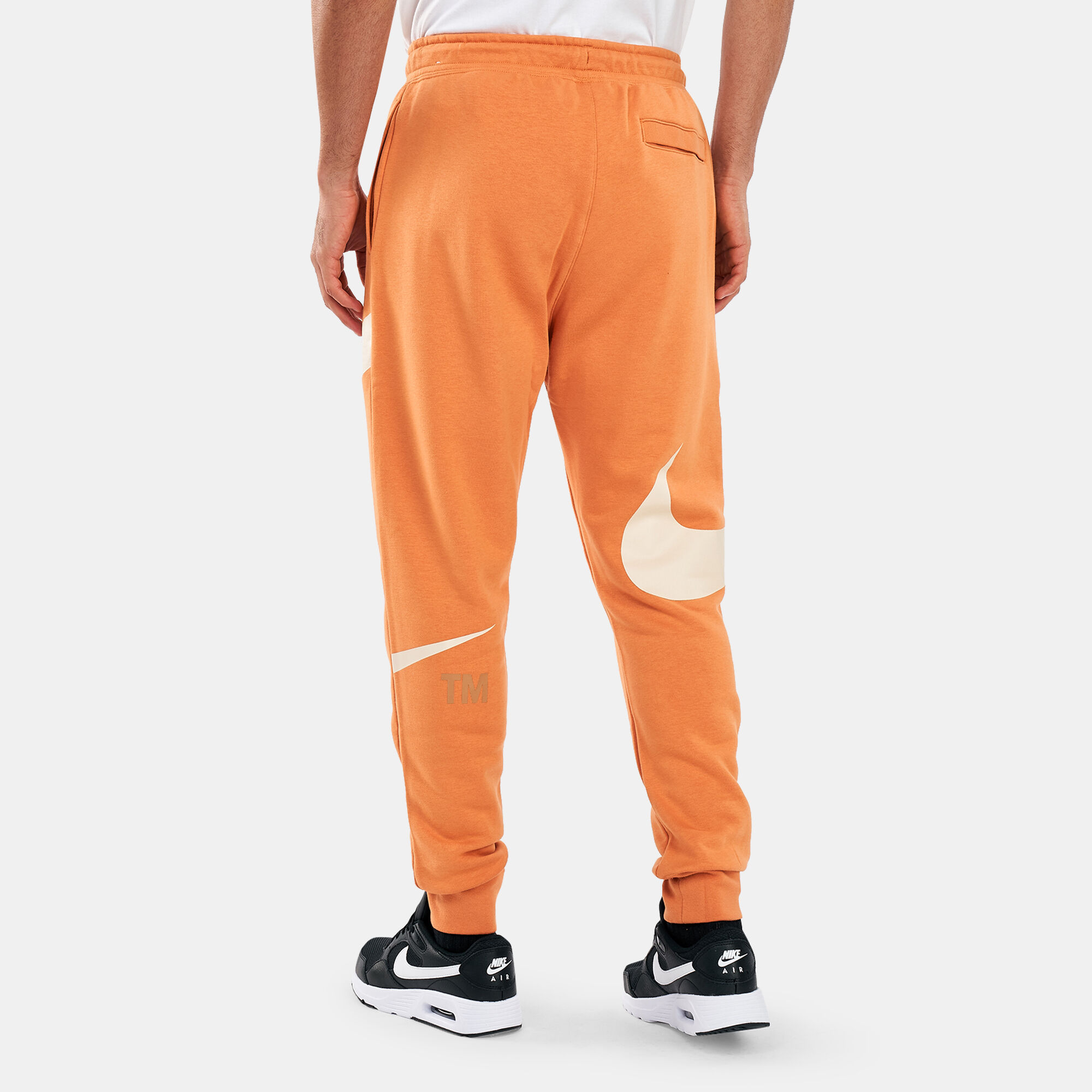Nike swoosh orange joggers online