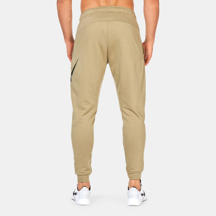 Nike Men's Dri-FIT Dry Graphic Tapered Training Pants Beige image number 1