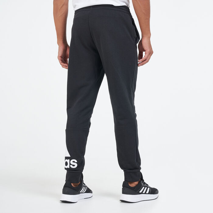 adidas Men's Essentials French Terry Tapered Cuff Logo Pants Black adidas Men's Essentials French Terry Tapered Cuff Logo Pants Black image number 1