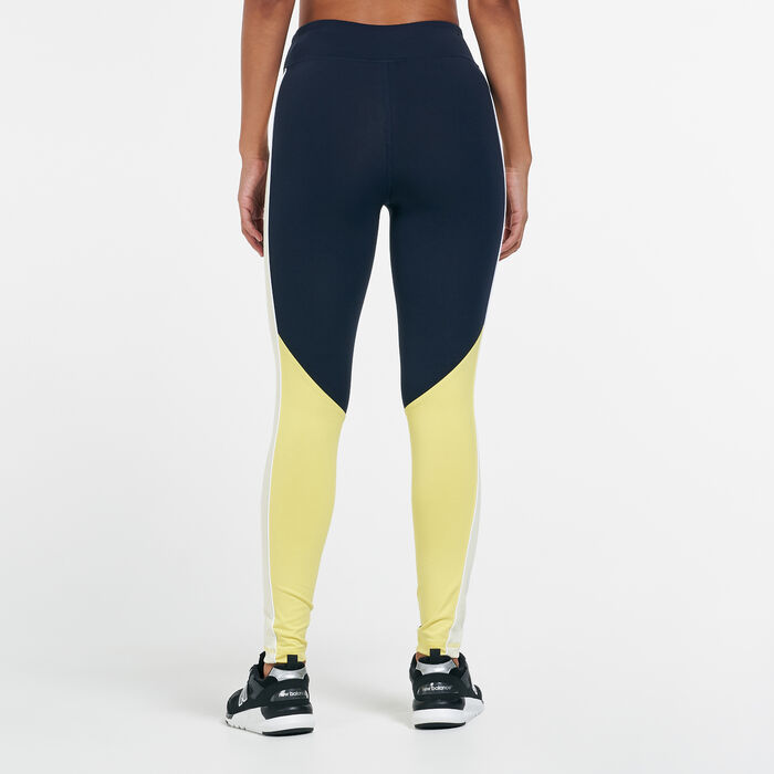 New Balance Women's Athletics Piping Leggings yellow New Balance Women's Athletics Piping Leggings yellow image number 1