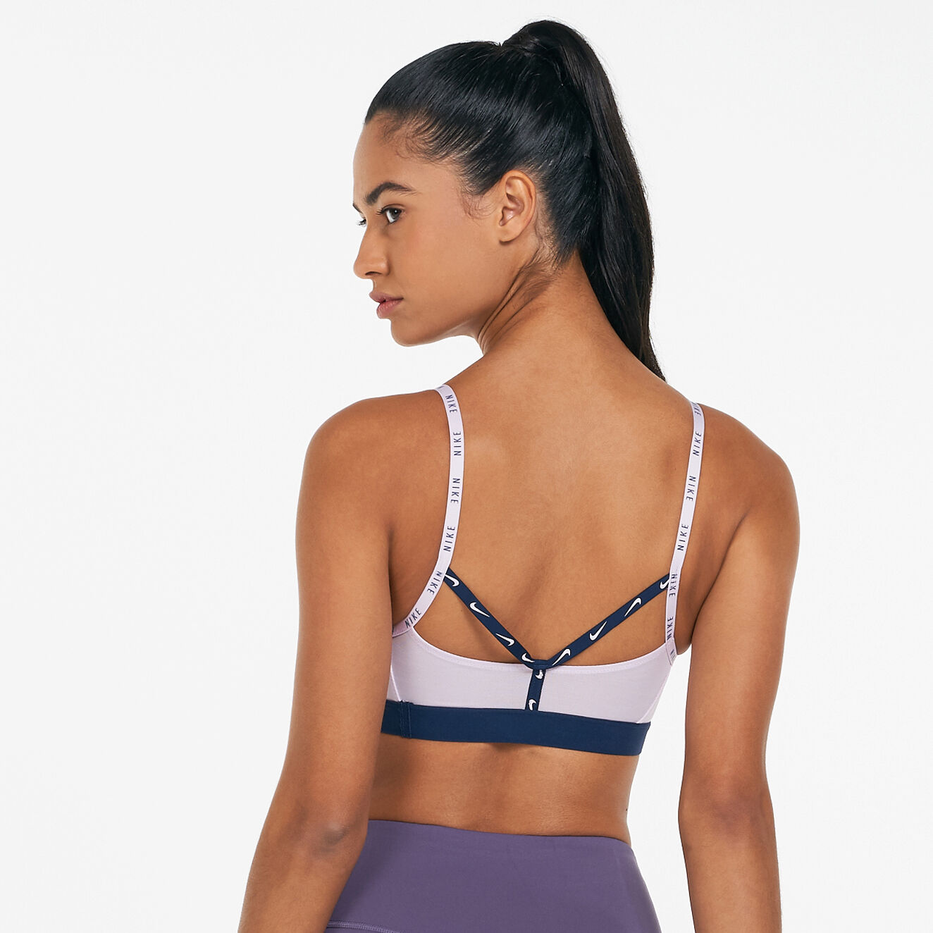 Women s Dri FIT Indy Logo Tape Sports Bra Pink Nike in Qatar SSS